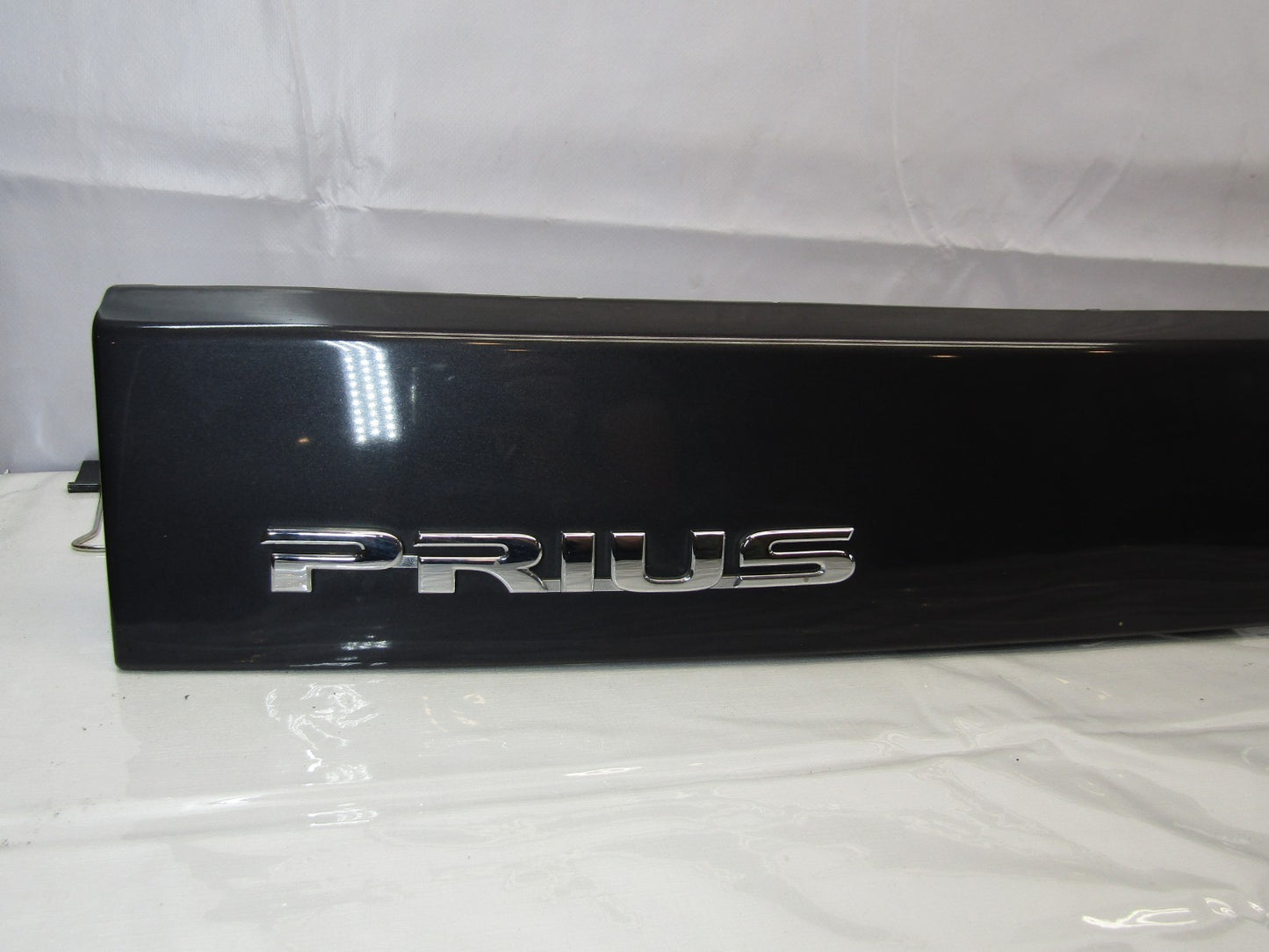 2010-2015 Toyota Prius Rear Garnish Trim Logo Emblem Badge Gray OEM