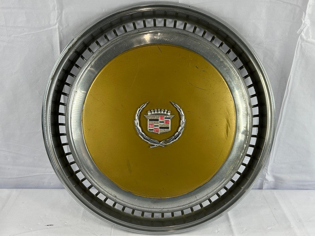 1970s Cadillac Eldorado Hubcap Yellow OEM