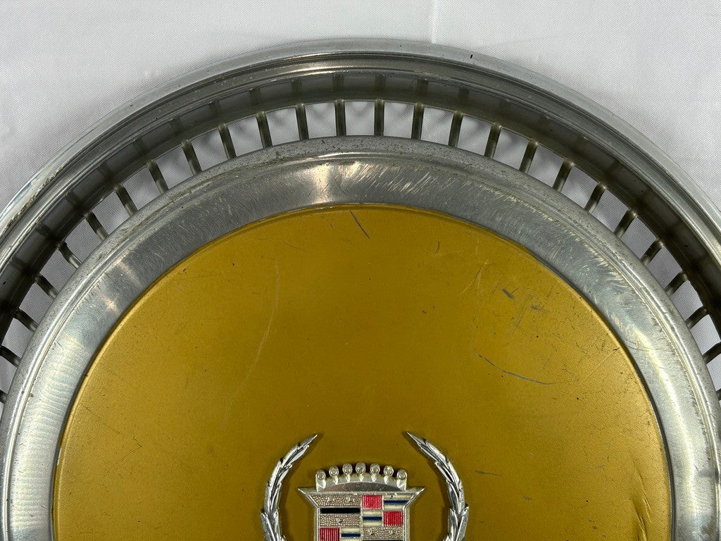 1970s Cadillac Eldorado Hubcap Yellow OEM