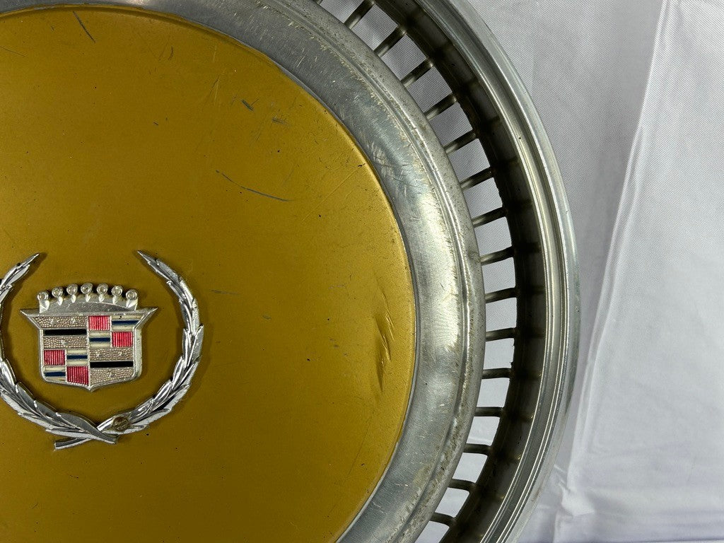 1970s Cadillac Eldorado Hubcap Yellow OEM