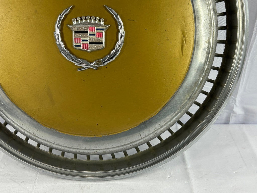 1970s Cadillac Eldorado Hubcap Yellow OEM