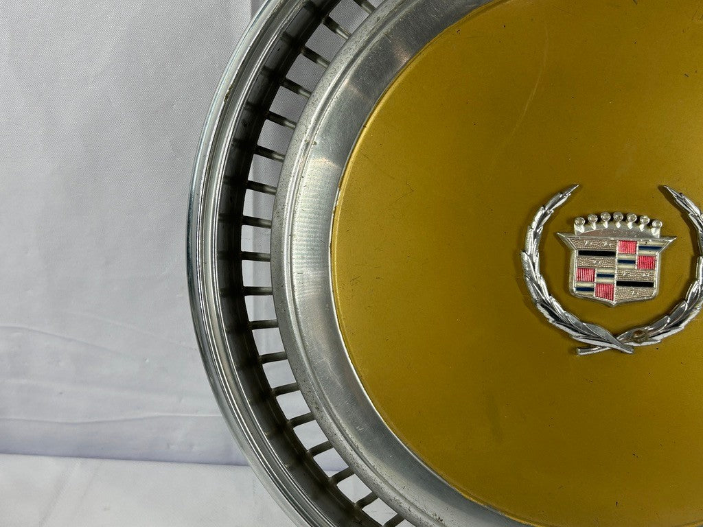 1970s Cadillac Eldorado Hubcap Yellow OEM