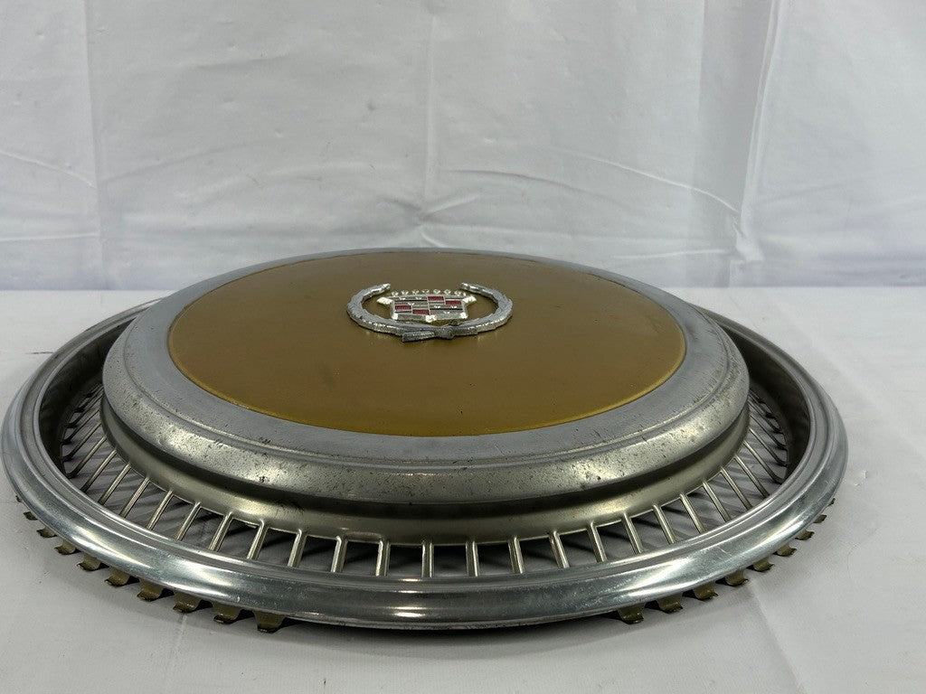 1970s Cadillac Eldorado Hubcap Yellow OEM
