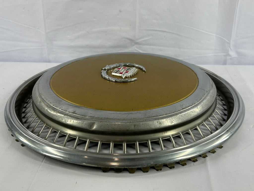 1970s Cadillac Eldorado Hubcap Yellow OEM