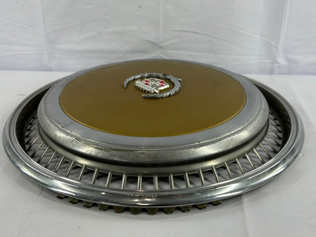 1970s Cadillac Eldorado Hubcap Yellow OEM
