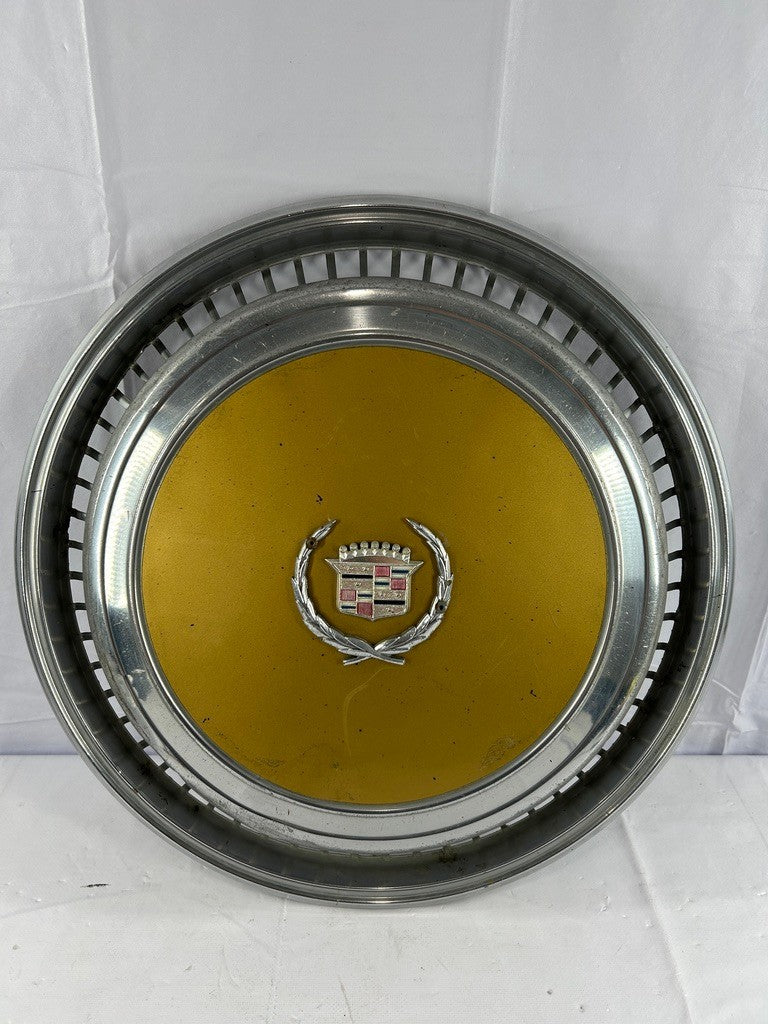 1970s Cadillac Eldorado Hubcap Yellow OEM