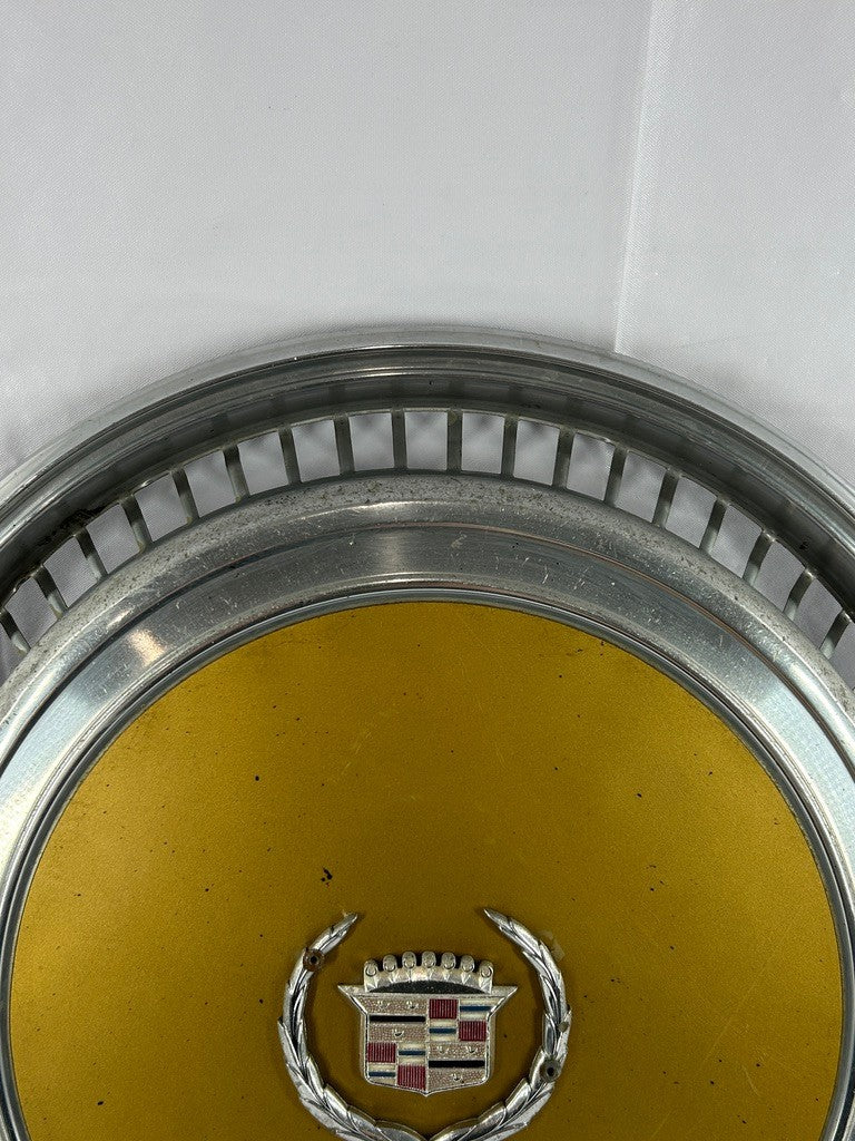 1970s Cadillac Eldorado Hubcap Yellow OEM