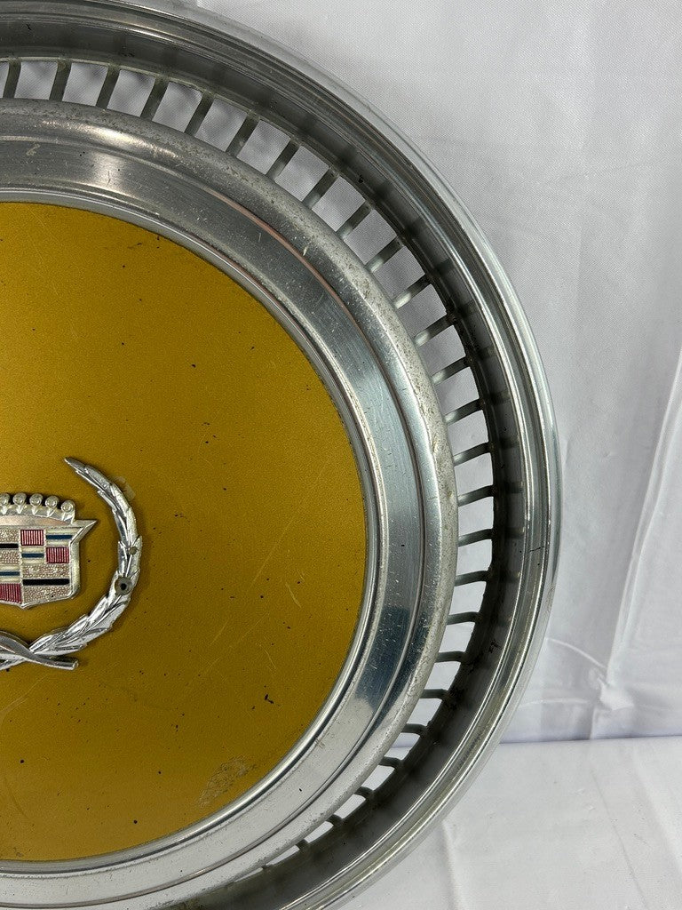 1970s Cadillac Eldorado Hubcap Yellow OEM