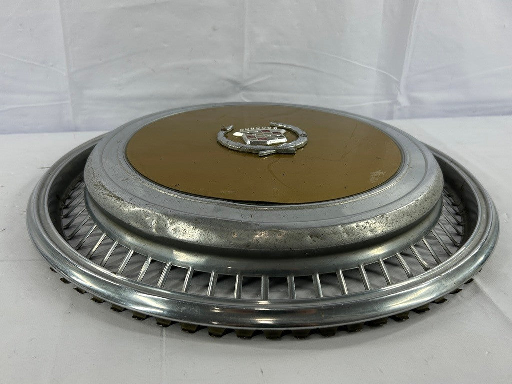 1970s Cadillac Eldorado Hubcap Yellow OEM