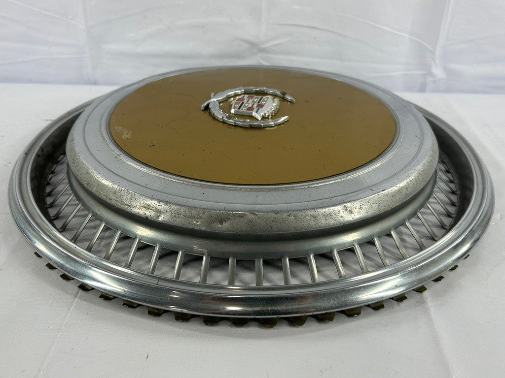 1970s Cadillac Eldorado Hubcap Yellow OEM