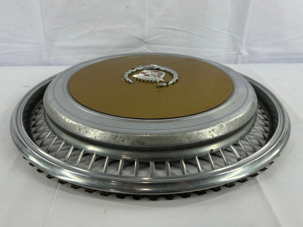1970s Cadillac Eldorado Hubcap Yellow OEM