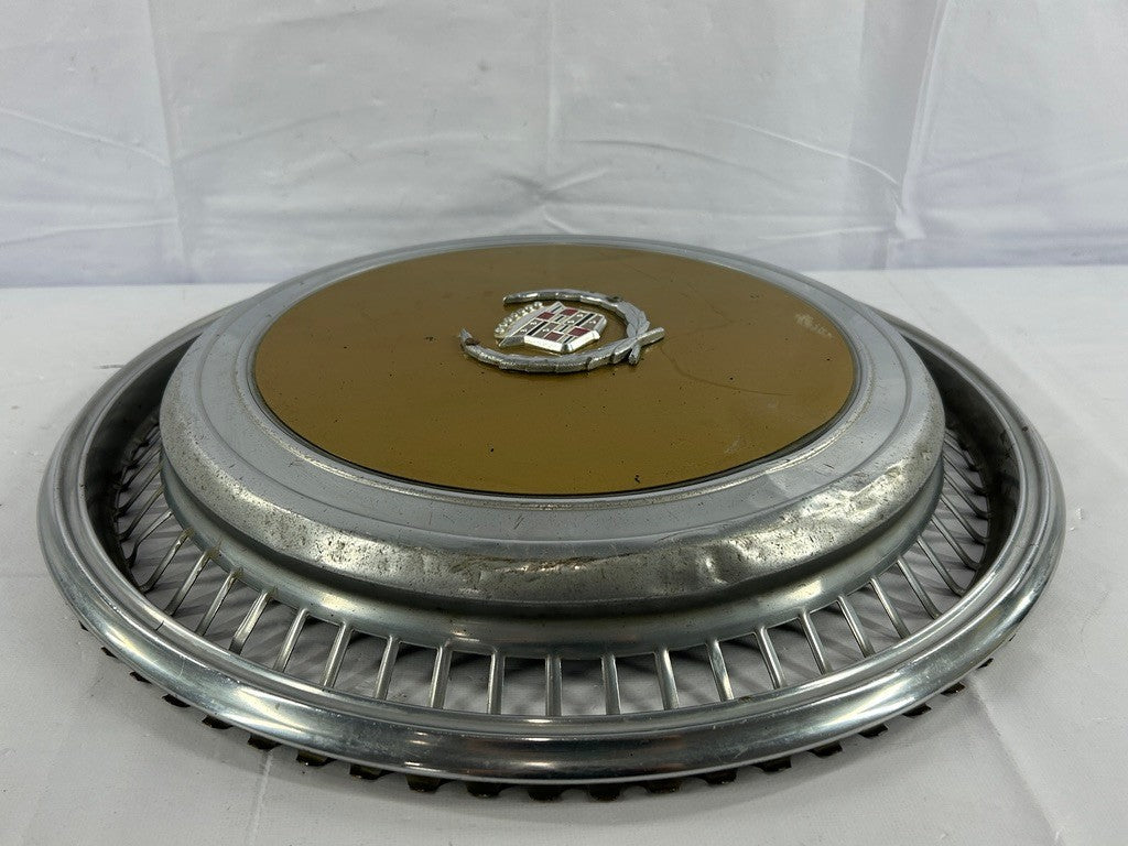 1970s Cadillac Eldorado Hubcap Yellow OEM