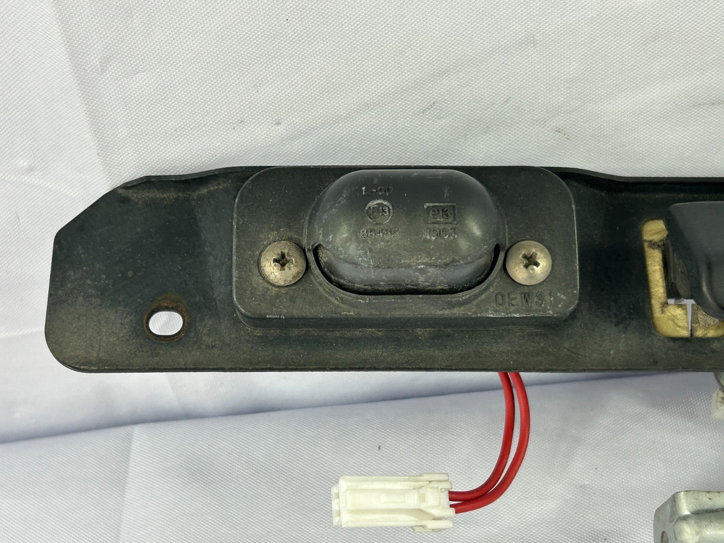 2000-2004 Subaru Outback License Plate Tag Light & Hatch Handle OEM 84301AE02A
