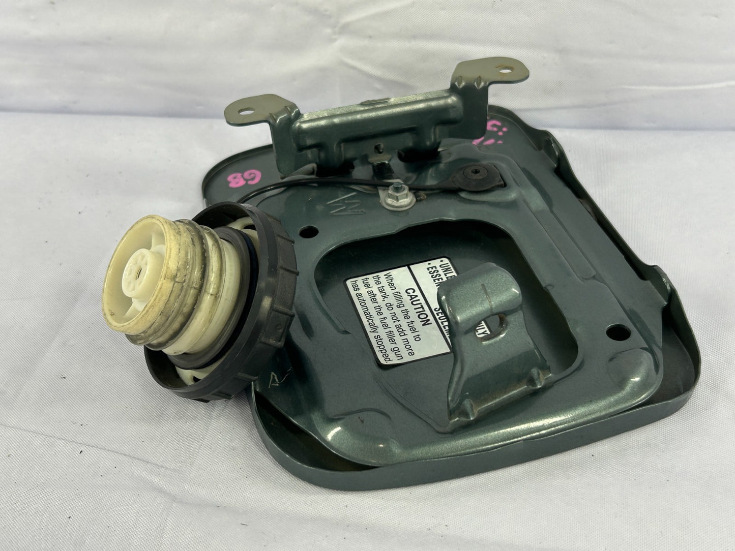 2000-2004 Subaru Outback Gas Fuel Tank Filler Door Lid W/Gas Cap  OEM 57601AE020