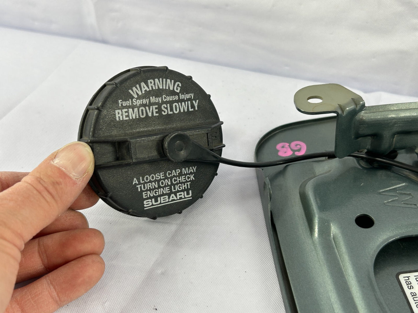 2000-2004 Subaru Outback Gas Fuel Tank Filler Door Lid W/Gas Cap  OEM 57601AE020