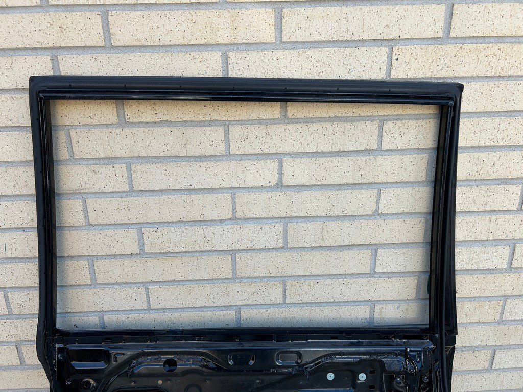1999-2002 Toyota Land Cruiser Left Rear Driver Door Shell Black OEM