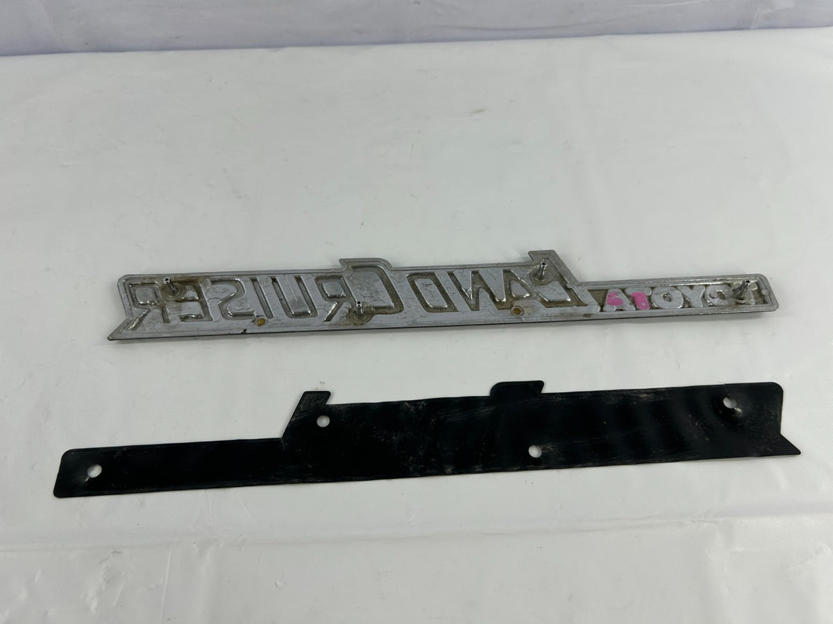 84-90 Toyota Land Cruiser FJ62 Rear Left Quarter Panel Emblem OEM 75370-90A02