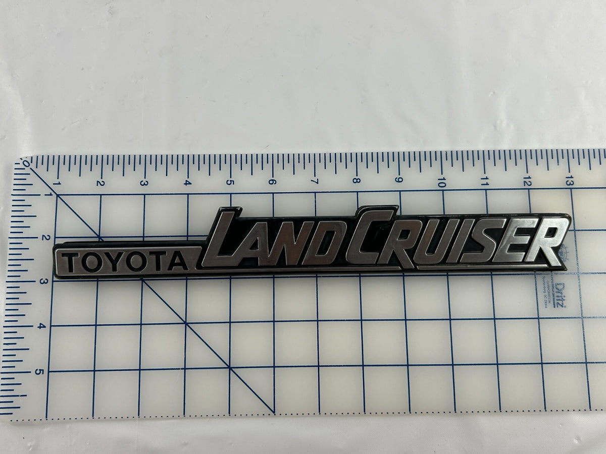 84-90 Toyota Land Cruiser FJ62 Rear Right Quarter Panel Emblem OEM 75370-90A02