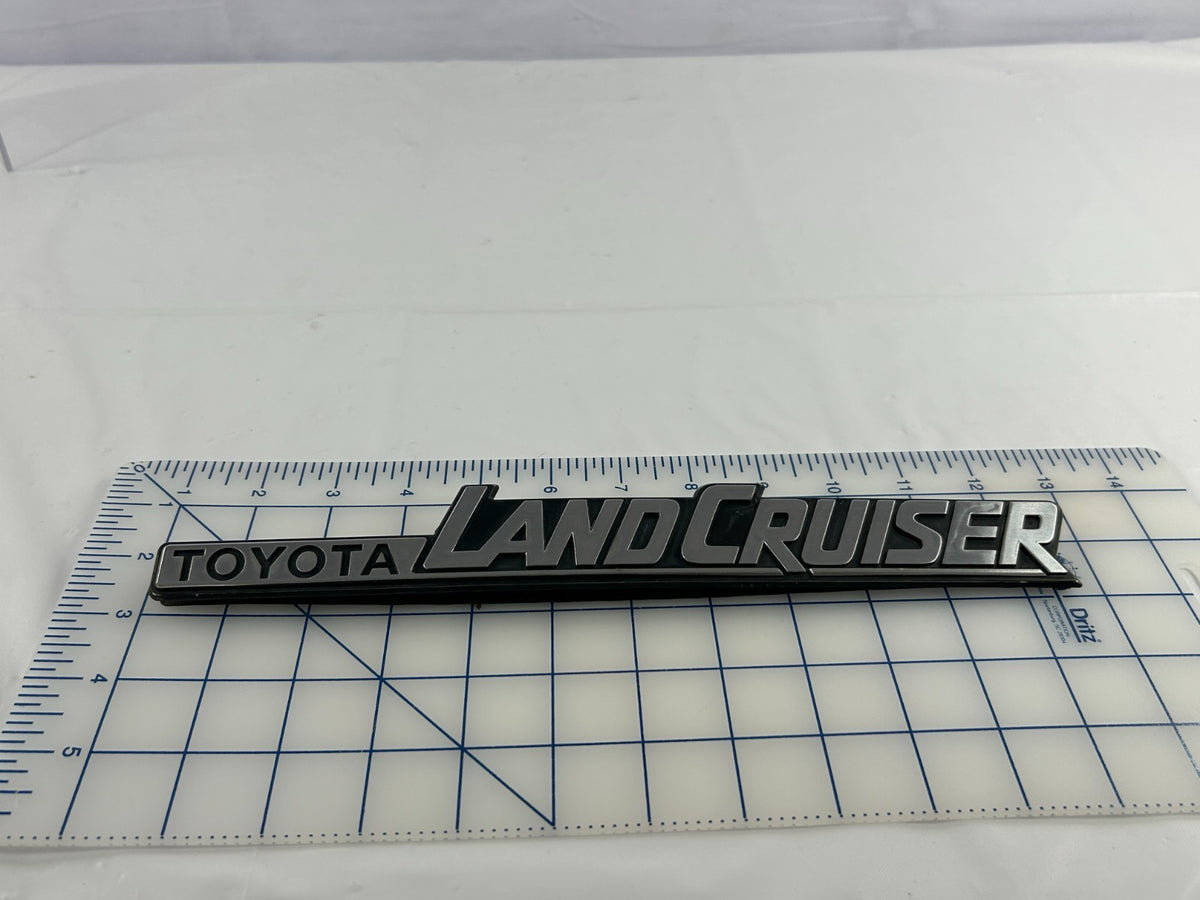 84-90 Toyota Land Cruiser FJ62 Rear Right Quarter Panel Emblem OEM 75370-90A02
